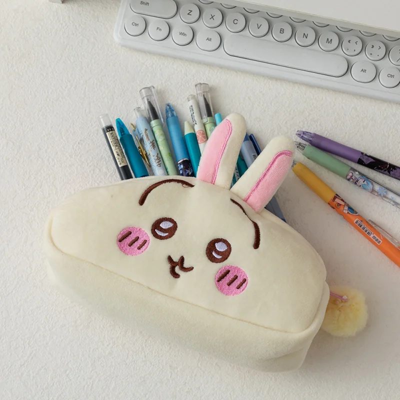 Trousse à crayons en peluche K - Packaging avis et prix